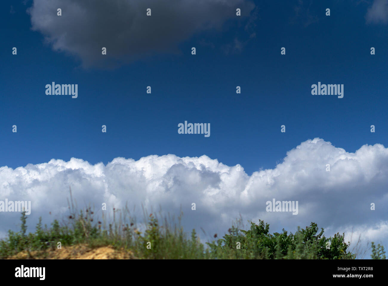 Dark storm clouds against blue sky. Sky before the storm Stock Photo ...