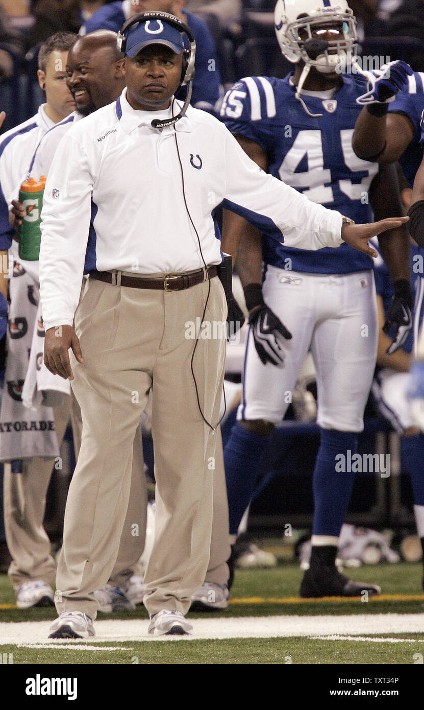 Indianapolis Colts head coach Jim Caldwell and his team watch the game on  Sunday, December 18, 2011, in Indianapolis, Indiana. The Indianapolis Colts  won their first game of the season 27-13. (Photo