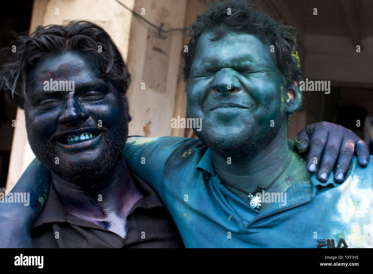 Hindu devotees celebrate 'Holi,' the festival of color, at the Bankey Bihari Temple on March 21, 2011 in Vrindavan, India. Holi is celebrated at the end of the winter season on the last full moon the lunar month Phalguna which usually falls in the later part of February or March.  UPI/Maryam Rahmanian Stock Photo
