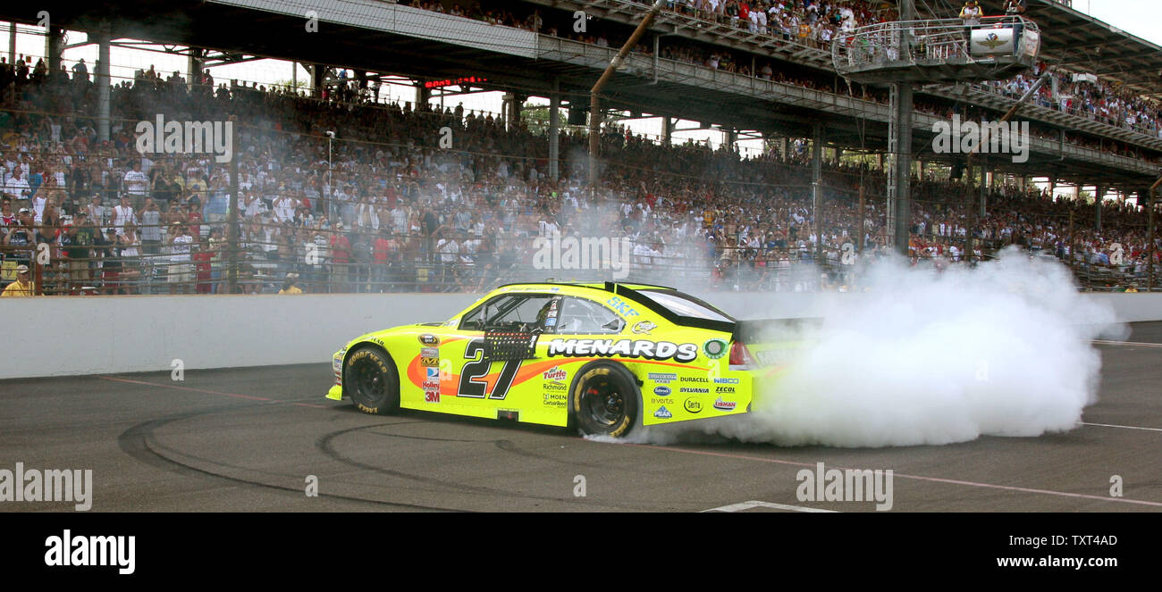 Paul Menard, winner of  the Brickyard 400 does a burnout for the fans in his Sylvania/Menards Chevrolet at Indianapolis Motor Speedway in Indianapolis, on July 31, 2011.  UPI /Edward Joseph Locke Stock Photo