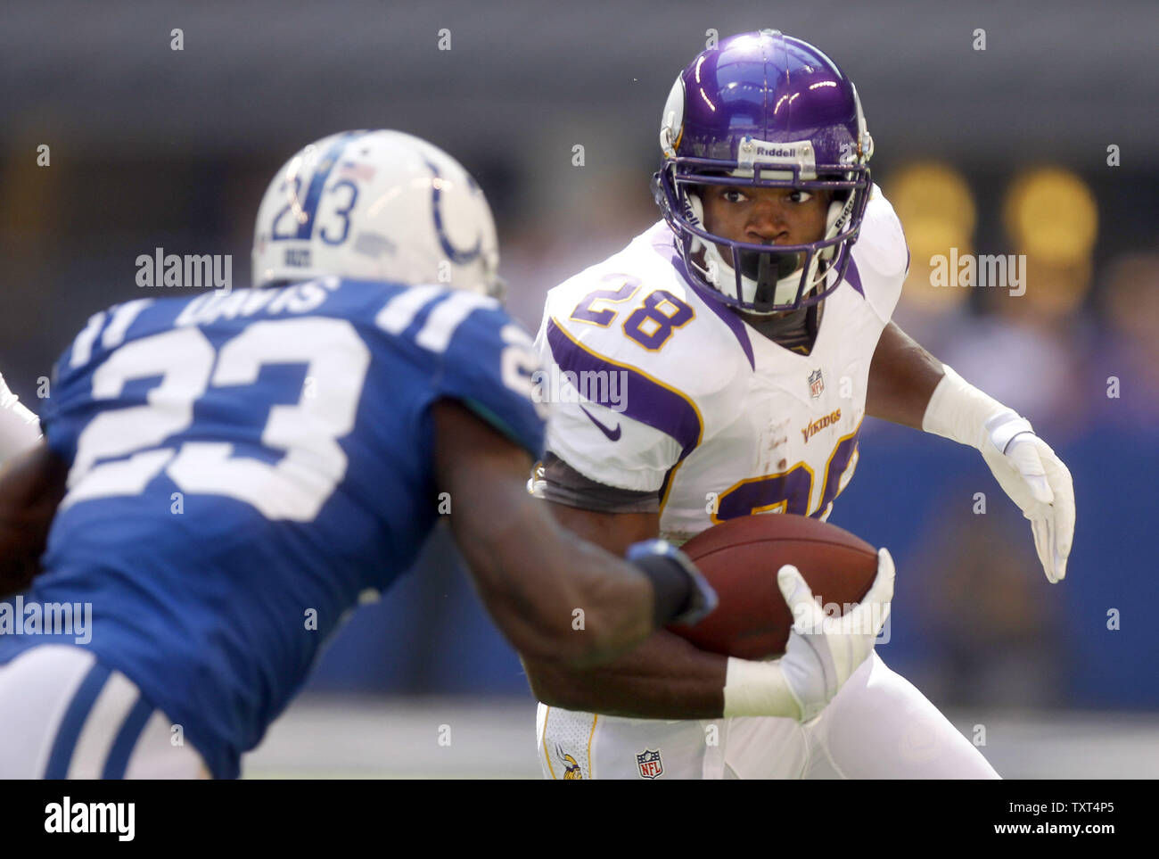 Minnesota Vikings running back Adrian Peterson (28) is pushed out of bounds by Indianapolis Colts cornerback Vontae Davis (23) after a 6-yard gain during the first quarter at Lucas Oil Stadium in Indianapolis, IN., September 16, 2012.  UPI /Mark Cowan Stock Photo