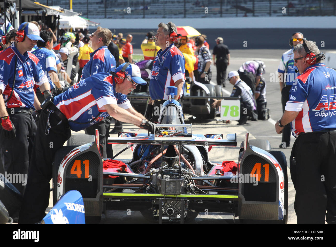 Team AJ Foyt Enterprises crew members prepare the number 41 car for rookie driver Conor Daly at the Indianapolis Motor Speedway on May 14, 2013 in Indianapolis, Indiana.     UPI/Ed Locke Stock Photo