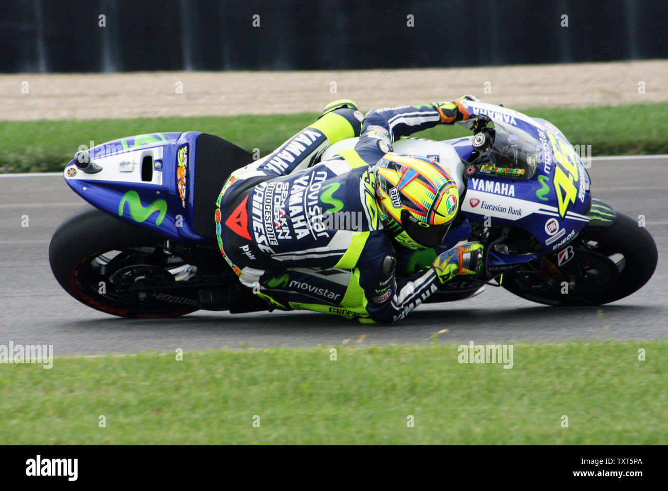 2008 Moto GP winner Valentino Rossi leads into the turn 11 hairpin early  during the 7th running of the Red Bull Moto GP at the Indianapolis Motor  Speedway on August 10, 2014