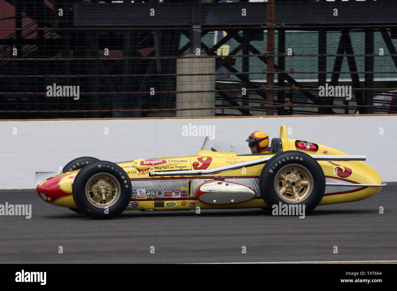 A vintage Watson Indy Roadster that popular driver Eddie Sachs drove in the 1963 Indianapolis 500 takes some laps during a special demonstration for the 99th running of the Indianapolis 500 at the Indianapolis Motor Speedway on May 21, 2015 in Indianapolis, Indiana.    Photo by Bill Coons/UPI Stock Photo