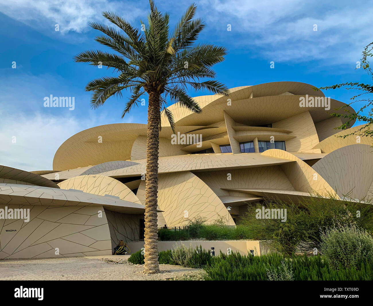 National museum of Qatar, Doha. The museum is shaped like a desert rose and is newly build. Stock Photo