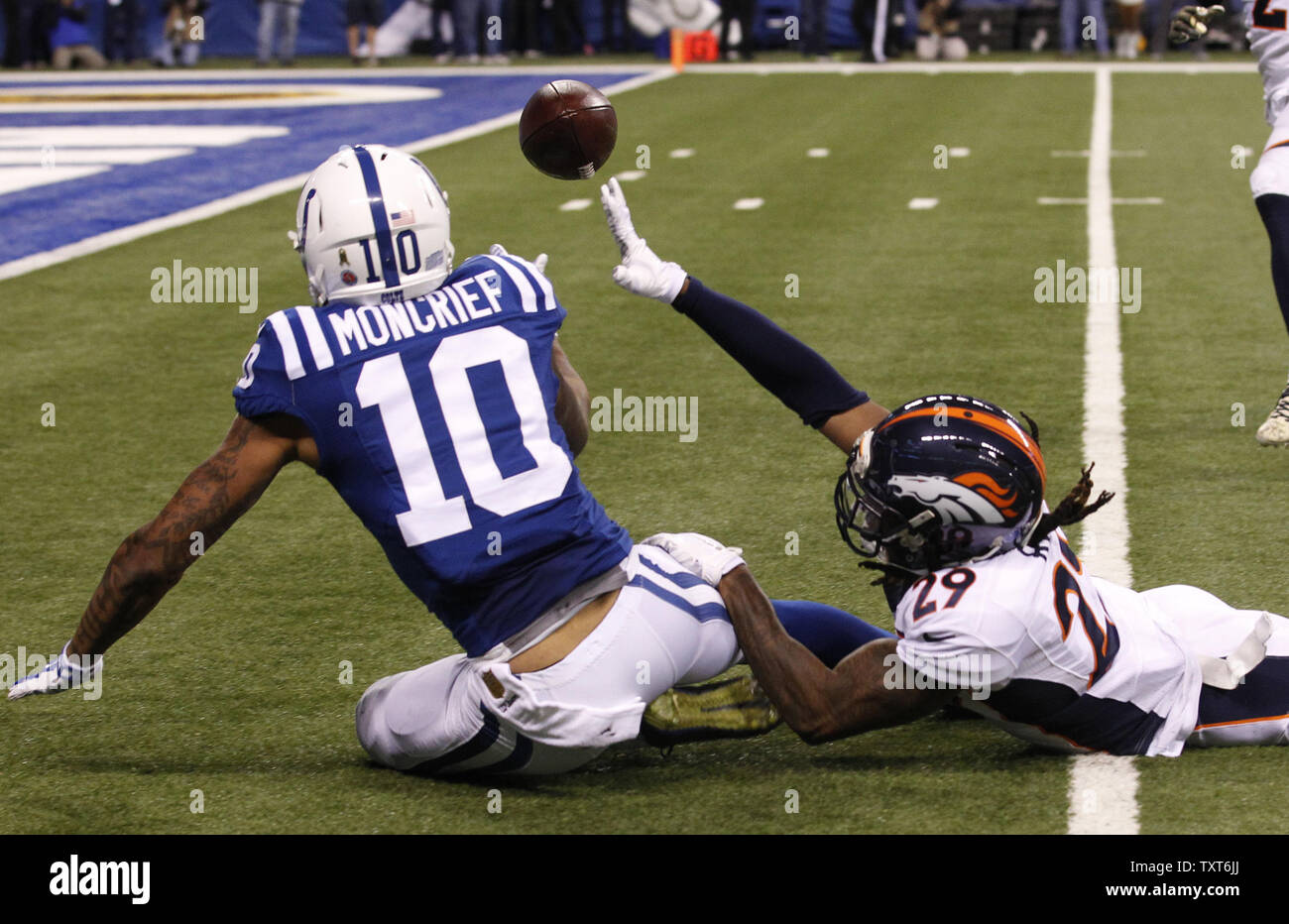 Indianapolis Colts wide receiver Donte Moncrief (10) can't make catch under pressure from Denver Broncos' Bradley Roby (29) during the second half of play at Lucas Oil Stadium in Indianapolis, Indiana, November 8, 2015.      Photo by John Sommers II/UPI Stock Photo