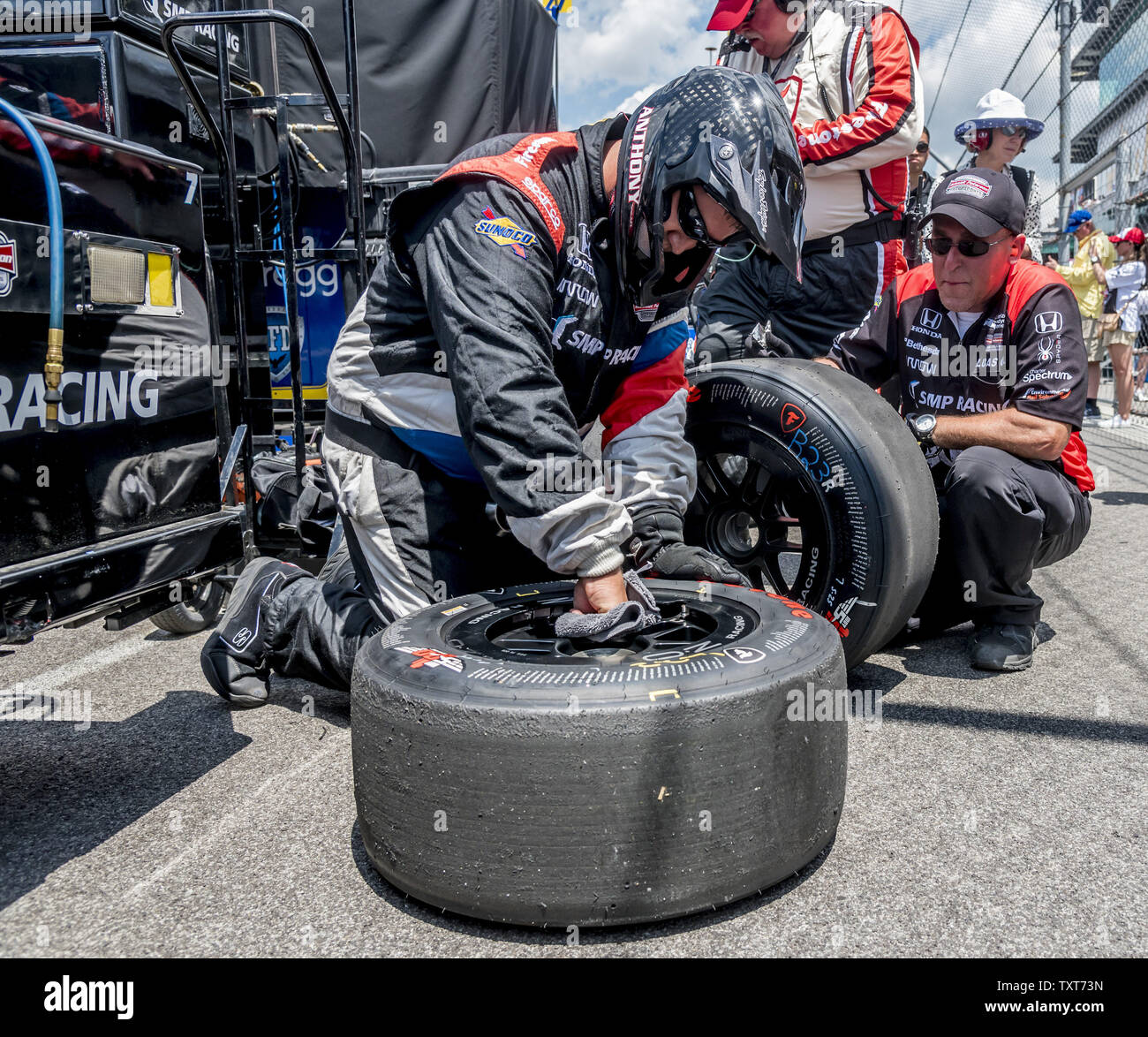 Crew members for the SMP Racing Schmidt Peterson Honda driven by