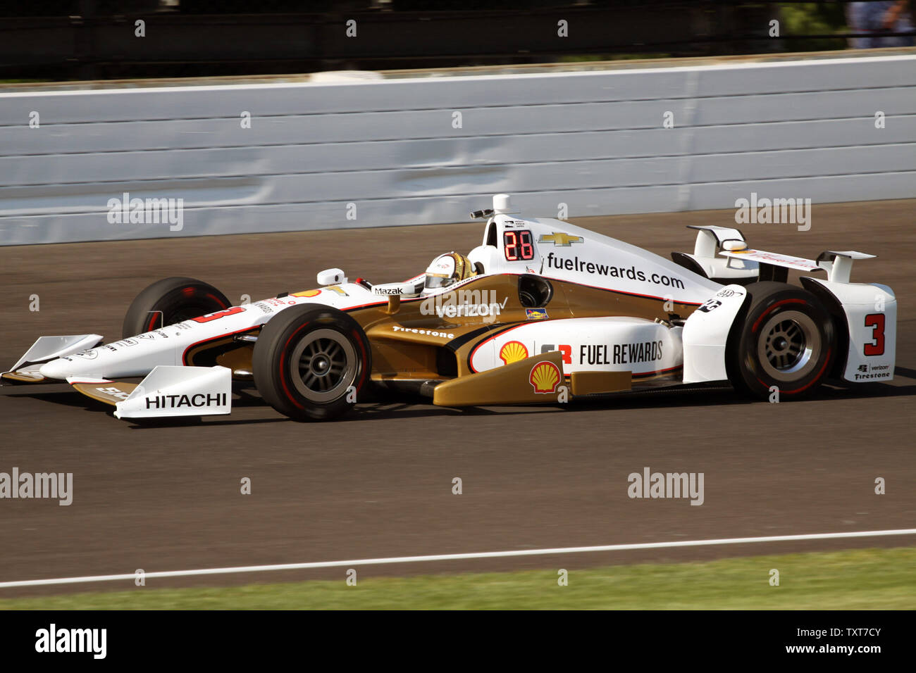 Three Time Indy 500 Champion Helio Castroneves Exits The Third Turn During Opening Day Practice At