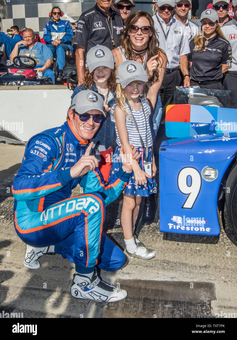 Scott Dixon, with help from daughters ( left to right) Poppy and Tilly