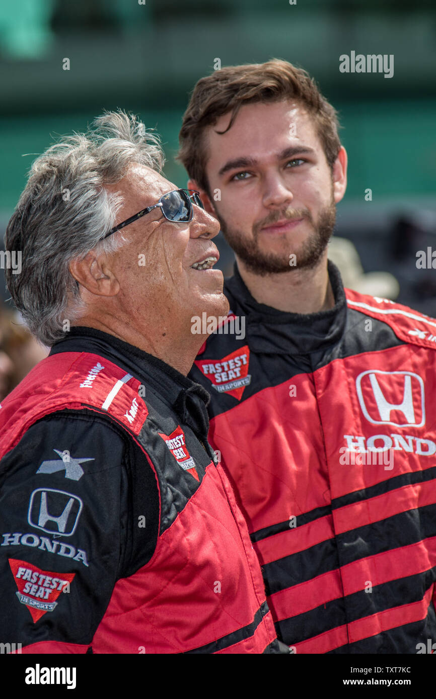 Grammy Winner Zed (right) awaits a ride in the two seater with Mario ...