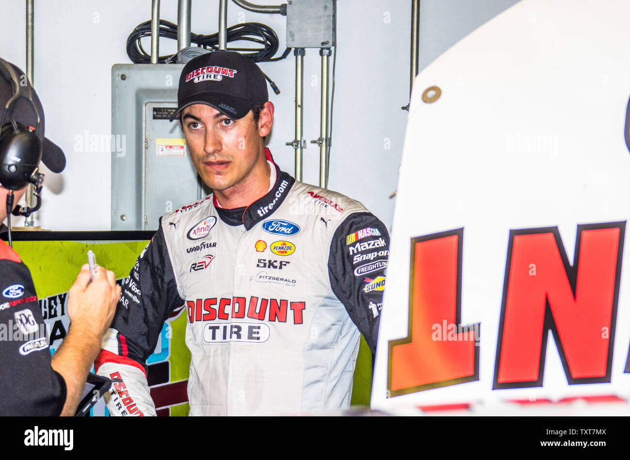 Joey Logano awaits the start of Xfinity series practice for the Lilly Diabetes 250 and 24th running of the Brickyard 400 at the Indianapolis Motor Speedway on July 21, 2017 in Indianapolis, Indiana.    Photo by Ed Locke/UPI Stock Photo