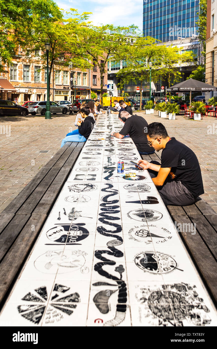 Long tiled table in public square - Place Sainte-Catherine, Brussels, Belgium. Stock Photo