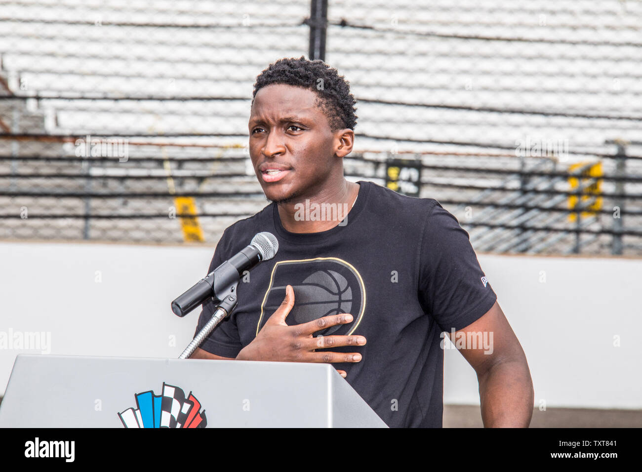 Indiana Pacers Guard Victor Oladipo speaks to the drivewrs and crowd gathered at the Drivers Meeting for the 2018 Indianapolis 500  at the Indianapolis Motor Speedway on May 26, 2018 in Indianapolis, Indiana. Photo by Edwin Locke/UPI Stock Photo