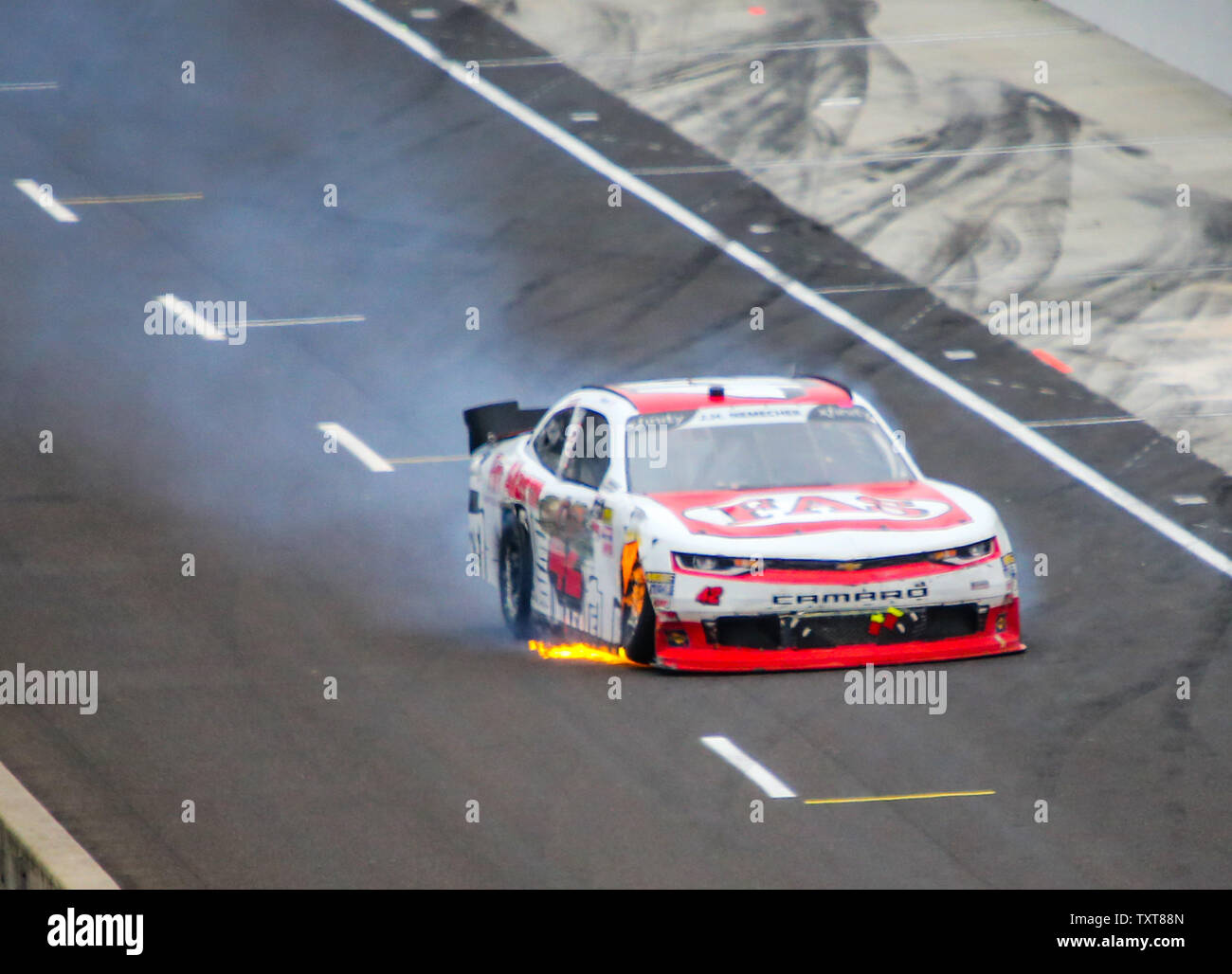 John Hunter Nemechek, Driver #42 Chip Ganassi Racing Chevrolet, on fire in Pit lane after he hit the wall during the 2018 Xfinity Series LILLY/Diabetes 250 at the Brickyard, at the Indianapolis Motor Speedway on September 10, 2018 in Indianapolis, Indiana. Photo by Mike GentryUPI Stock Photo