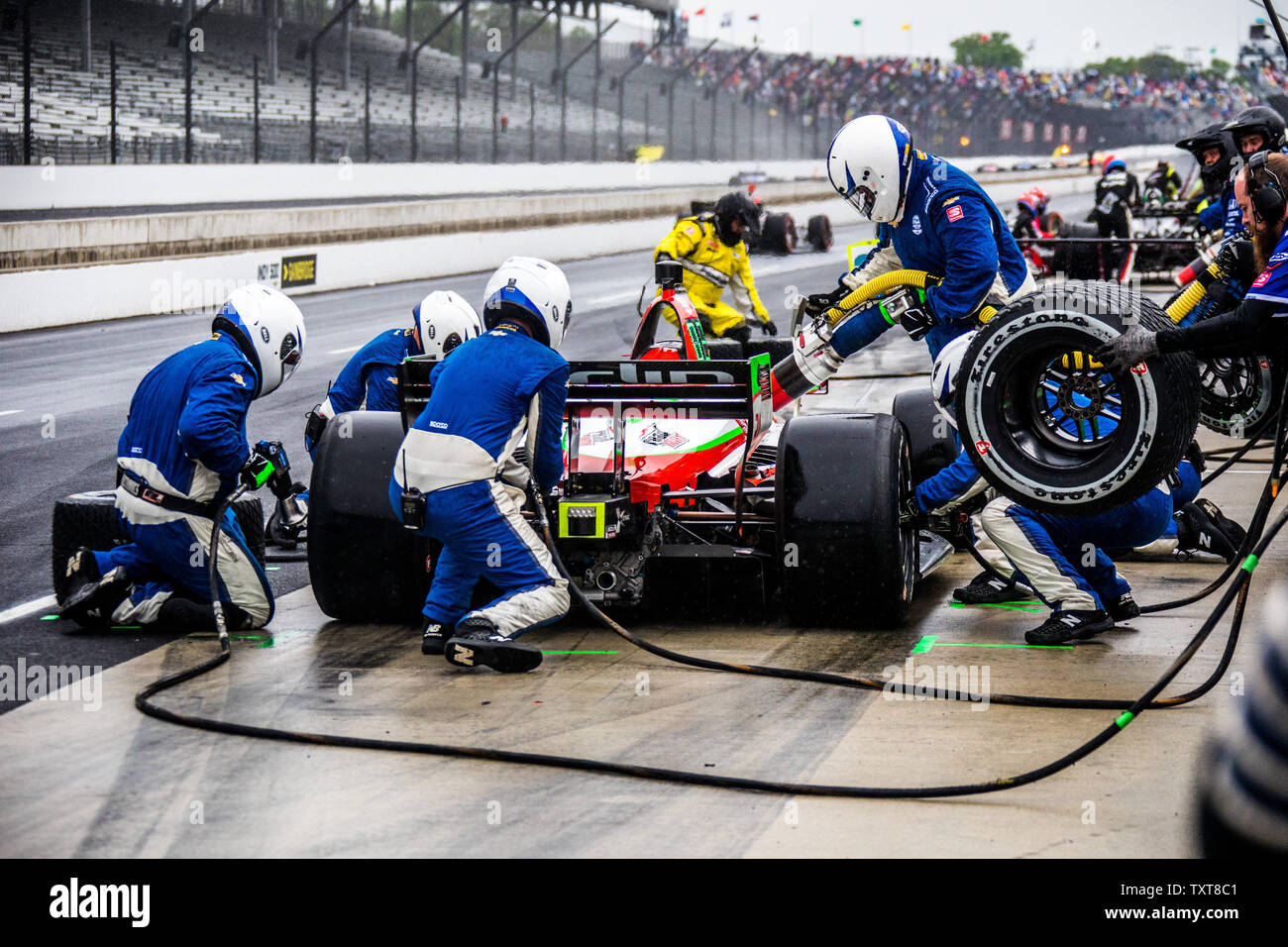 Pato O'Ward's crew works furiously during his final pit stop during  the 2019 IndyCar Grand Prix, on May 11, 2019 in Indianapolis, Indiana. Photo by Edwin Locke/UPI Stock Photo