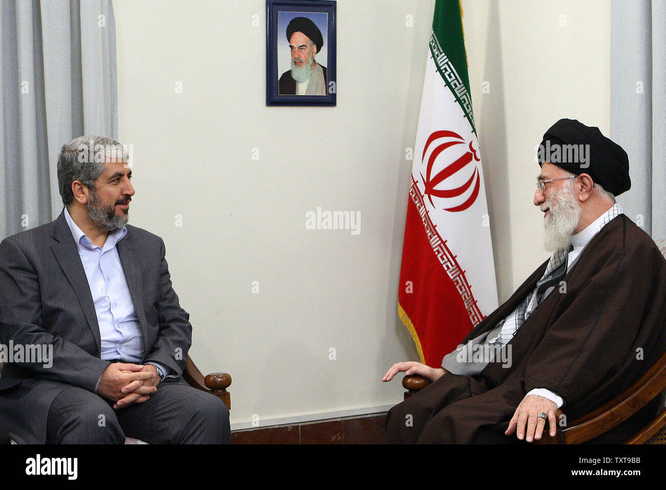 Iran's Supreme Leader Ayatollah Ali Khamenei (R) speaks with  Hamas leader Khaled Meshaal  during an official meeting in Tehran, Iran on December 15, 2009.     UPI Stock Photo