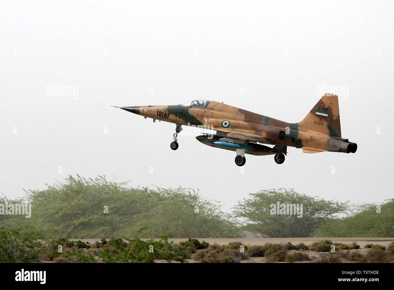 An Iranian F5 jet fighter takes off during a large maneuver at Sea of Oman in Iran on June 23, 2009.  (UPI Photo/Ebrahim Norouzi/STR) Stock Photo