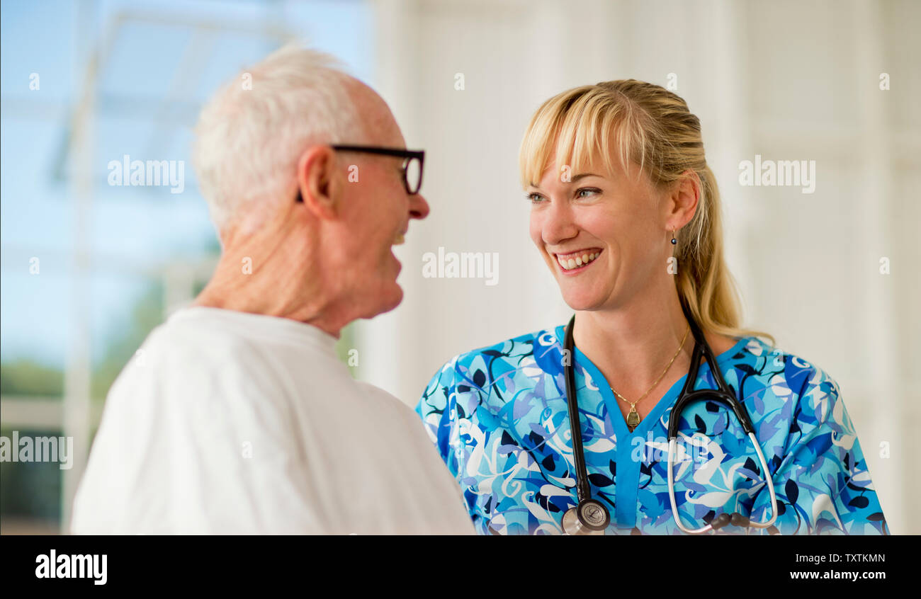 Speaking female nurse in hi-res stock photography and images - Alamy