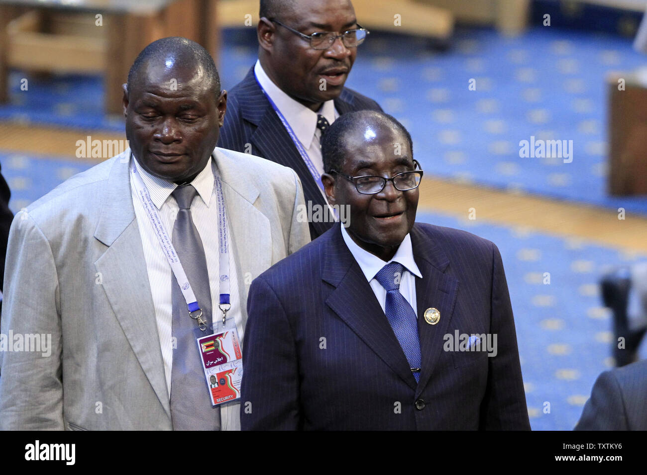 Bob R Rahmanian Zimbabwe's president Robert Mugabe (R) attends the opening ceremony of ...