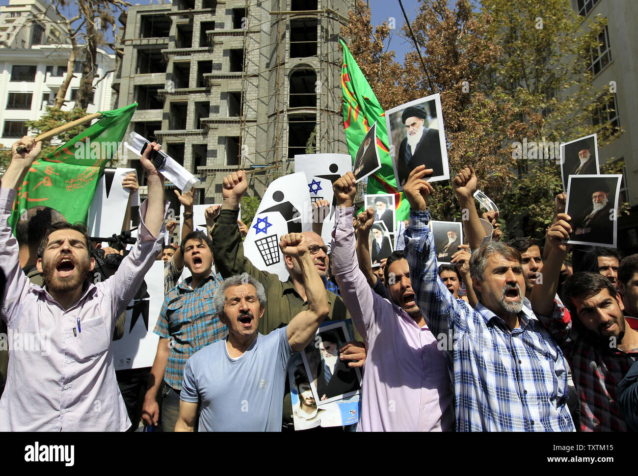 Iranian demonstrators chant anti-American slogans during a demonstration against the anti-Islam movie made in the US in front of the Swiss Embassy in Tehran, Iran on September 13, The Swiss Embassy