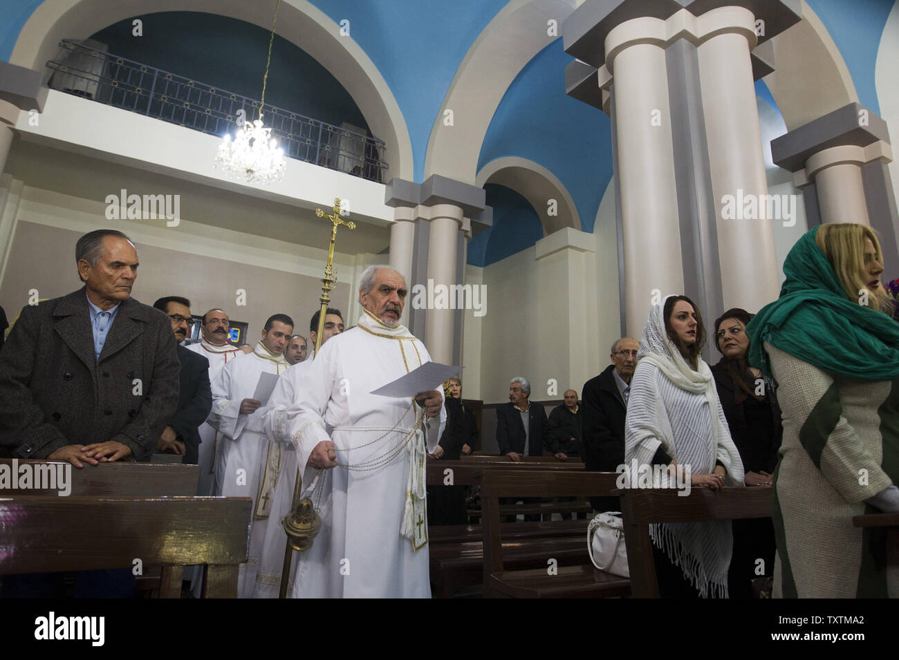Iranian Christians attend Christmas Eve mass at the Saint Josef