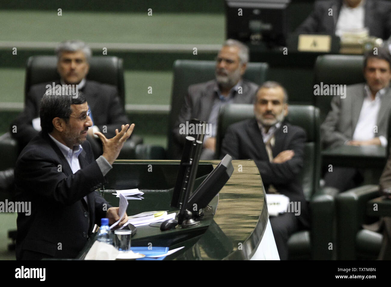 Iranian President Mahmoud Ahmadinejad speaks during the impeachment of labor minister Abdolreza Sheikholeslami, unseen, at the parliament in Tehran, Iran on February 3, 2013. Out of 272 lawmakers in the parliament on Sunday, 192 voted against the labor minister. The main reason behind the MP's decision to dismiss the minister was Sheikholeslami's refusal  to remove former Tehran prosecutor general Saeed Mortazavi from his post as the director of the Social Security Organization.     UPI/Maryam Rahmanian Stock Photo