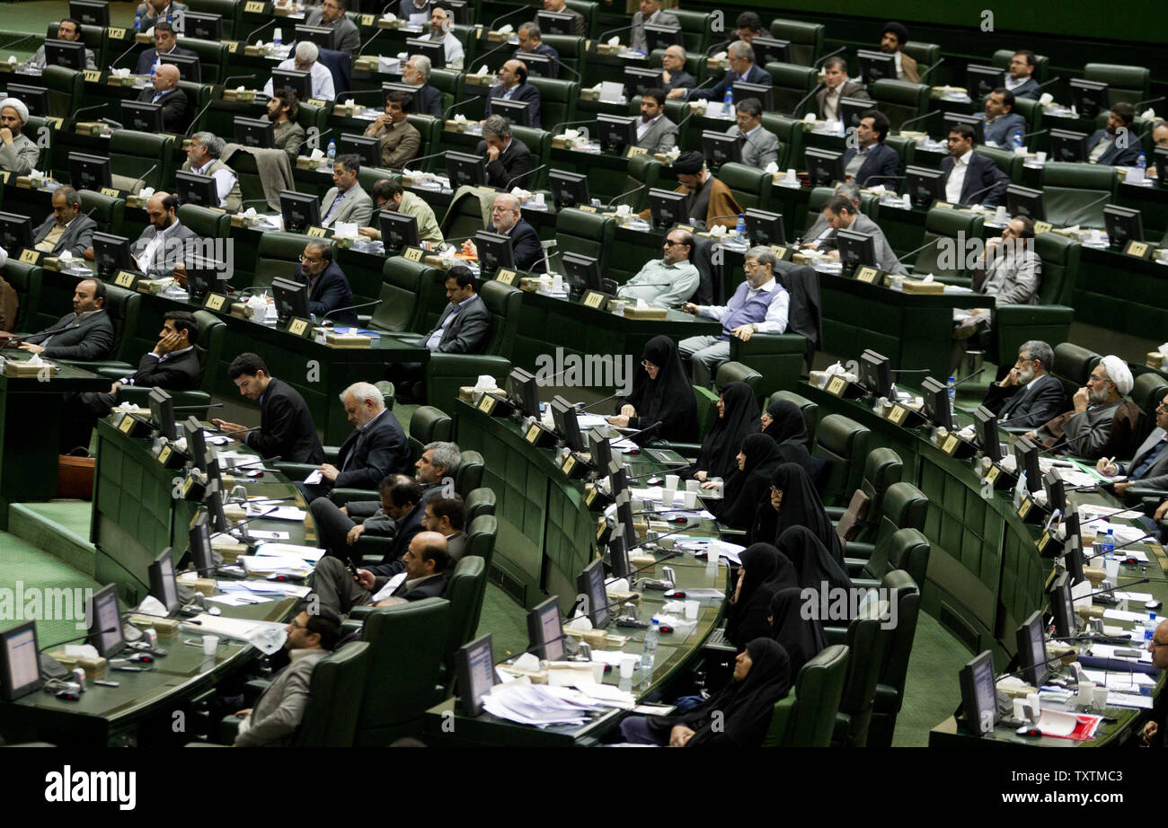 Iranian President Mahmoud Ahmadinejad (not pictured) speaks during the impeachment of the labor minister Abdolreza Sheikholeslami, unseen, at the parliament in Tehran, Iran on February 3, 2013. Out of 272 lawmakers in the parliament on Sunday, 192 voted against the labor minister. The main reason behind the MP's decision to dismiss the minister was Sheikholeslami's refusal  to remove former Tehran prosecutor general Saeed Mortazavi from his post as the director of the Social Security Organization.     UPI/Maryam Rahmanian Stock Photo