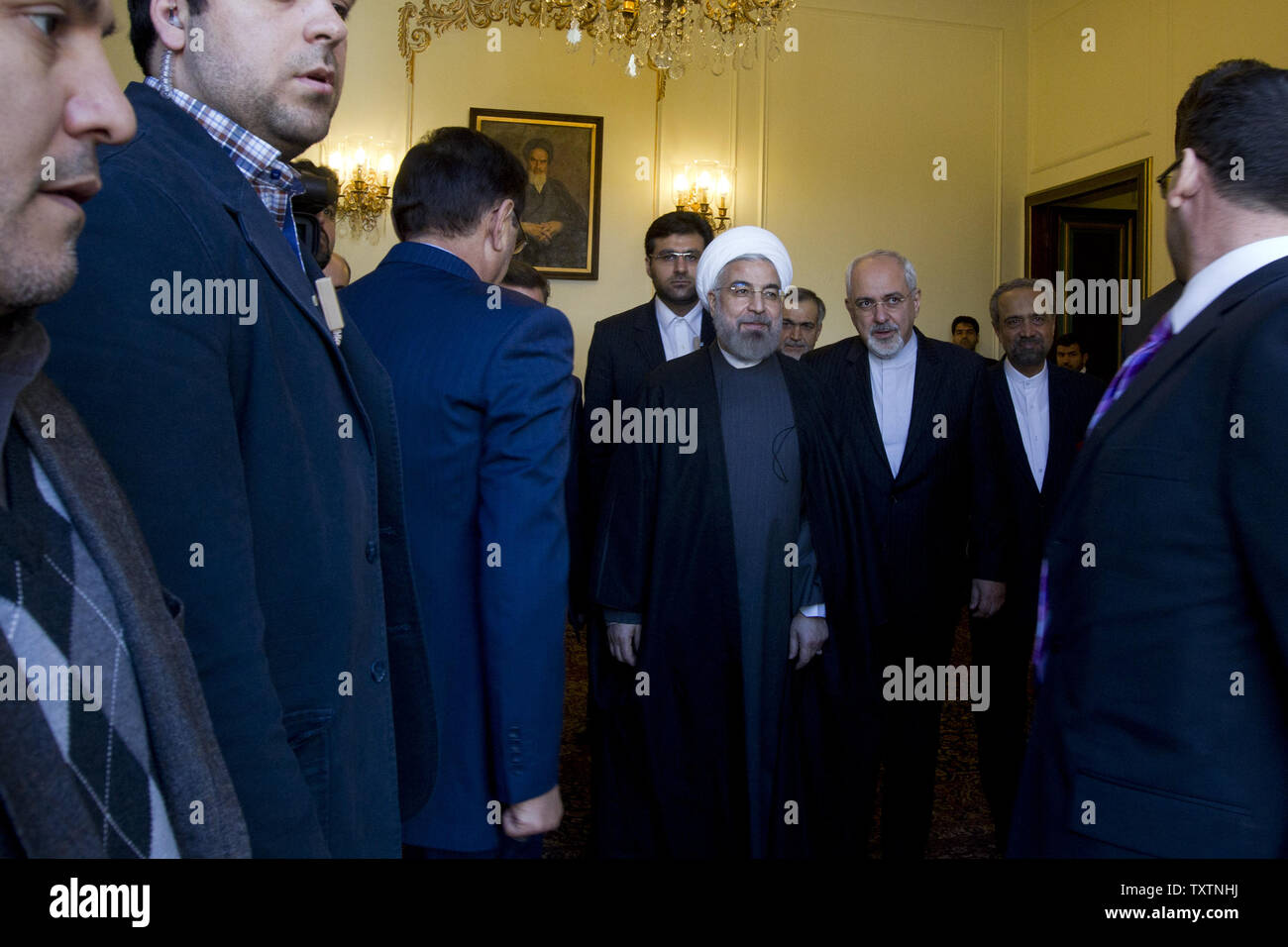 Iranian President Hassan Rouhani stands next to Iran's Foreign Minister Mohammad Javad Zarif (R) prior to the arrival of Turkish Prime Minister Recep Tayyip Erdogan (Not pictured) in Tehran, Iran on January 29, 2014. Erdogan arrived in Tehran at the head of a high-ranking delegation to discuss key bilateral and regional issues with senior Iranian officials.     UPI/Maryam Rahmanian Stock Photo