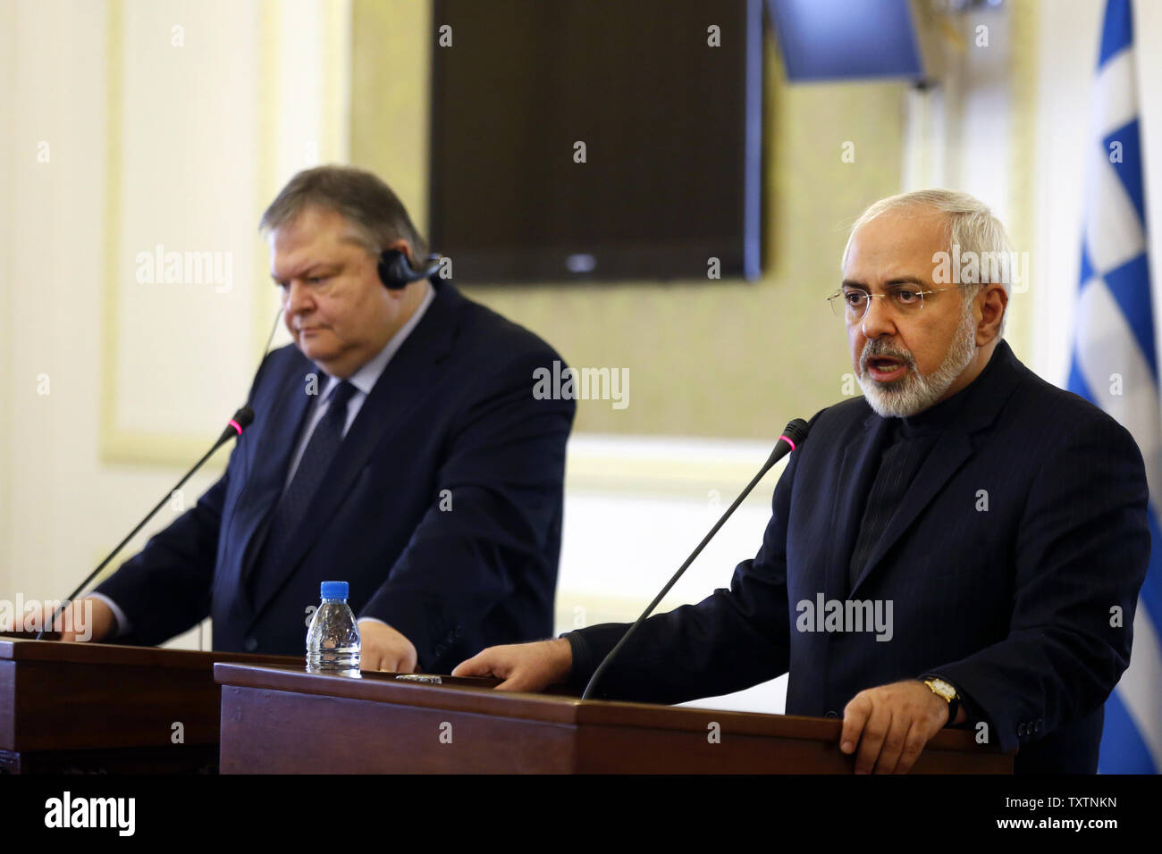 Iranian FM Mohammad Javad Zarif (R) speaks as Evangelos Venizelos, Greek foreign minister (L) listens during their joint press conference at Iranian Foreign ministry in Tehran, Iran on March 15, 2014. Venizelos is also scheduled to hold talks with other Iranian officials to discuss ways of expansion of bilateral ties between Athens and Tehran.     UPI/Maryam Rahmanian Stock Photo