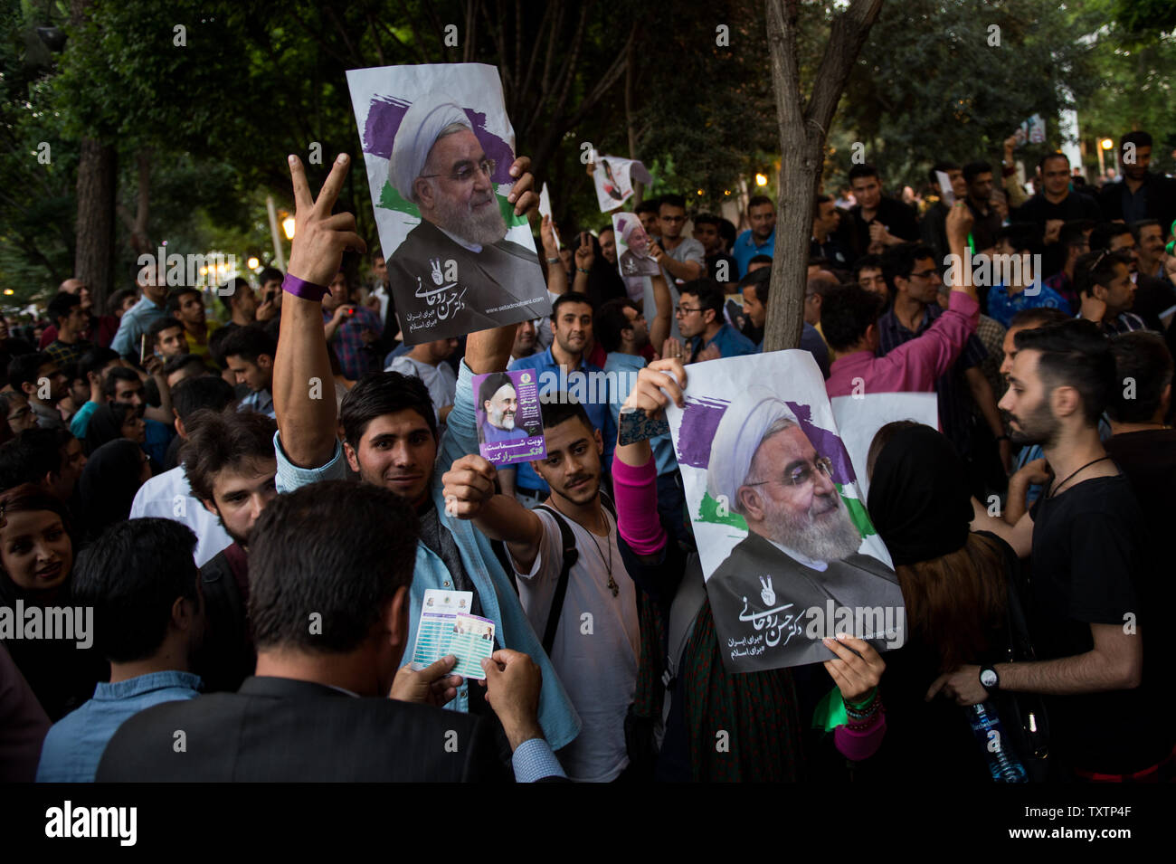 Supporters Of Iranian President Hassan Rouhani Rally In The Streets If ...