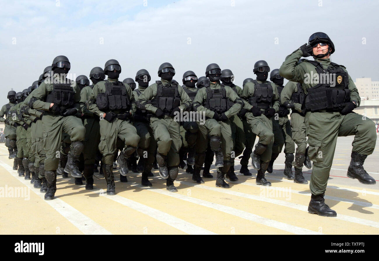 Iraqi national police celebrate during a Police Day ceremony in Baghdad, Iraq on January 9, 2009. Police Day marks the 87th anniversary of the Iraqi police force. (UPI photo/Ali Jasim) Stock Photo