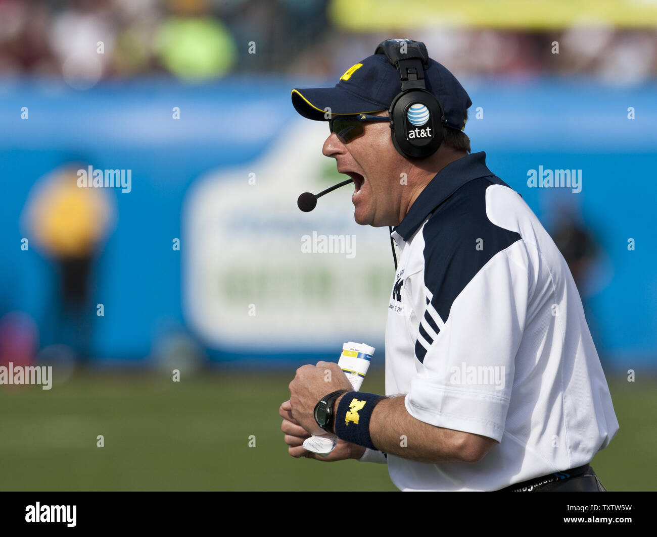 Michigan head coach Rich Rodriguez shouts instructions in the 1st half of their NCAA BCS bowl football game against Mississippi State at EverBank field in Jacksonville, Florida January 1, 2011.  UPI/Mark Wallheiser. Stock Photo