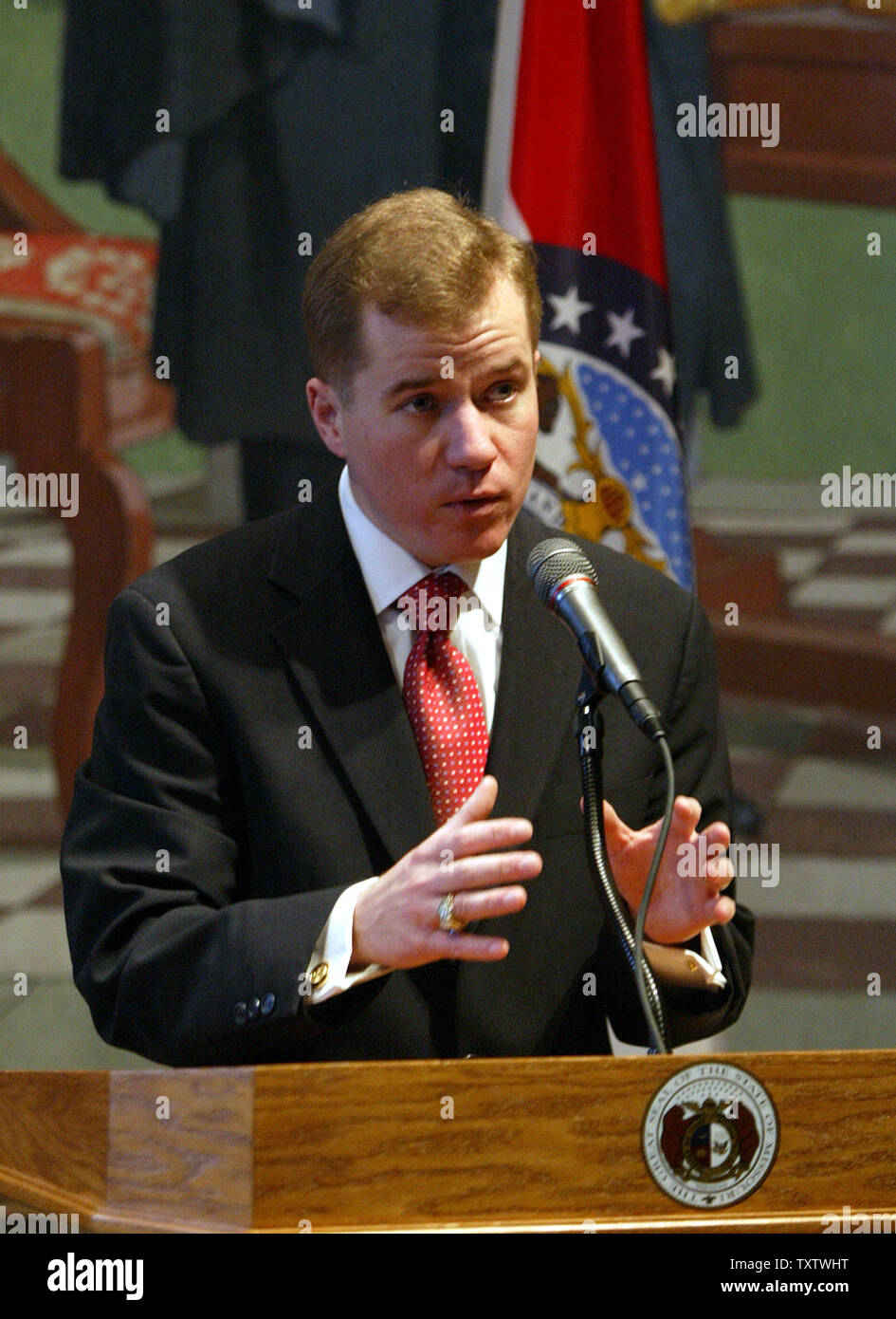 Mo. Gov. Matt Blunt speaks to reporters on his first full day at work in the State Capitol in Jefferson City, Mo on January 11, 2005. Blunt announced the revocation of former Gov. Bob Holden's executive order which sanctioned collective bargaining for state agencies which sought to allow service unions to take money out of the paychecks of state workers. Blunt also announced cost-cutting measures like the closing of the state's Washington, D.C. office, a freeze on the purchase of non-emergency vehicles, cell phones and the purchase and leasing of new office space for state agencies. (UPI Photo Stock Photo