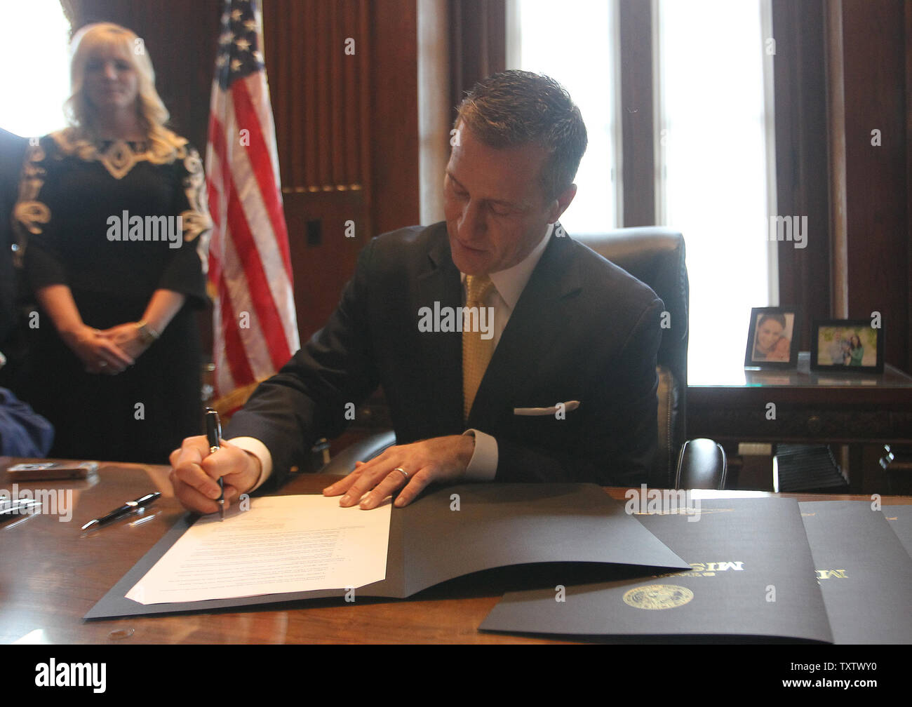 Missouri new Governor Eric Greitens signs his first piece of legislation after being sworn in as Missouri's 56th Governor in Jefferson City, Missouri on January 9, 2017. Executive order 17-02 bans gifts from lobbyists to state employees.  Photo by Bill Greenblatt/UPI Stock Photo