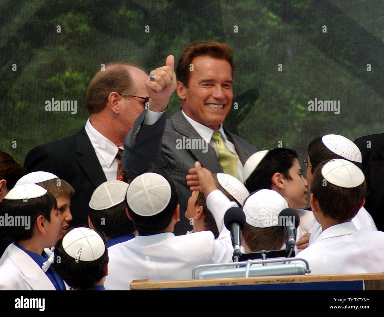 California Governor Arnold Schwarzenegger is surrounded by an Israeli