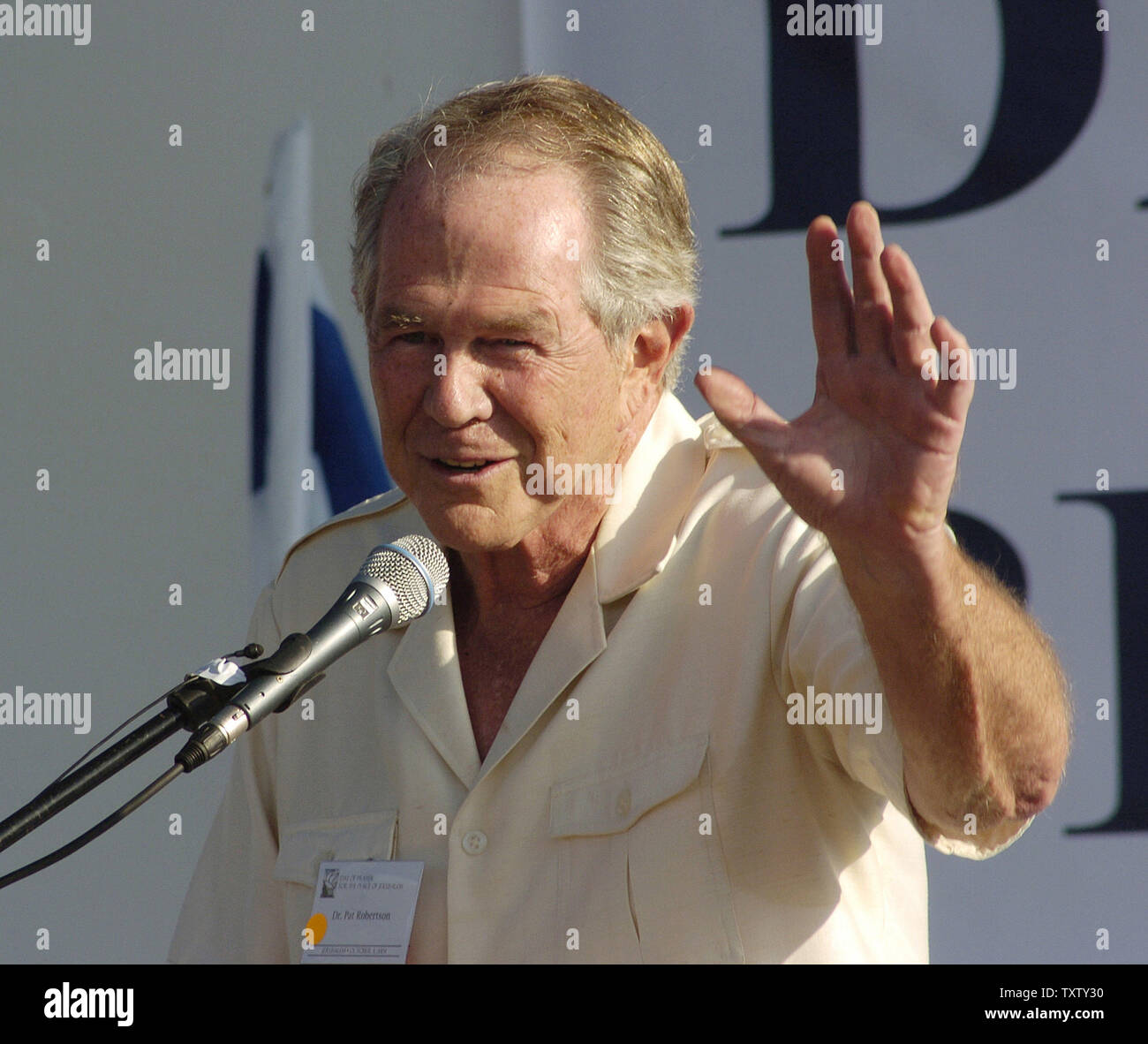 Dr. Pat Robertson, Founder of the Christian Broadcasting Network and host of the 700 Club speaks  to several thousand Christians and Jews during 'The Day of Prayer for the Peace of Jerusalem' prayer event in the Wohl Rose Garden in front of the Israeli Knesset in Jerusalem, October 3, 2004. (UPI Photo/Debbie Hill) Stock Photo