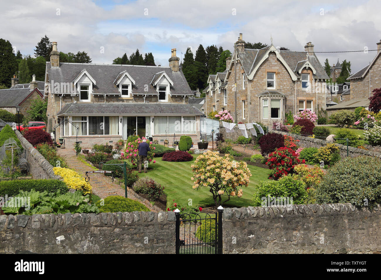 Gardens and Victorian style houses in Pitlochry in Scotland Stock Photo