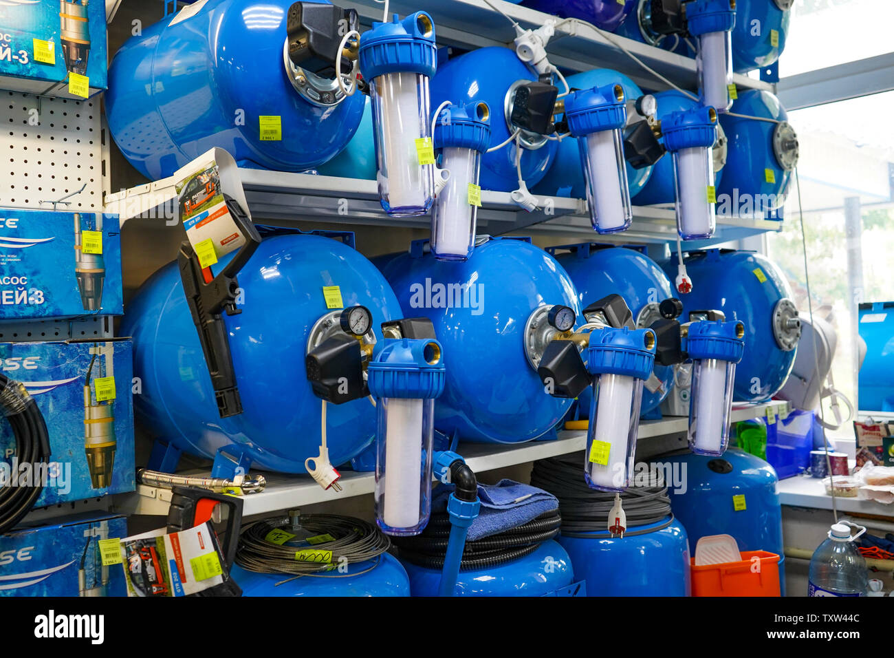 Chelyabinsk Region, Russia - JUNE 2019. Plumbing shop. Rack with goods ...