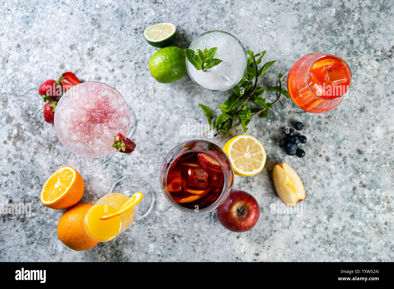 Selection of refreshing summer drinks - mojito, sangria, mimosa, aperol, martini, rustic background Stock Photo
