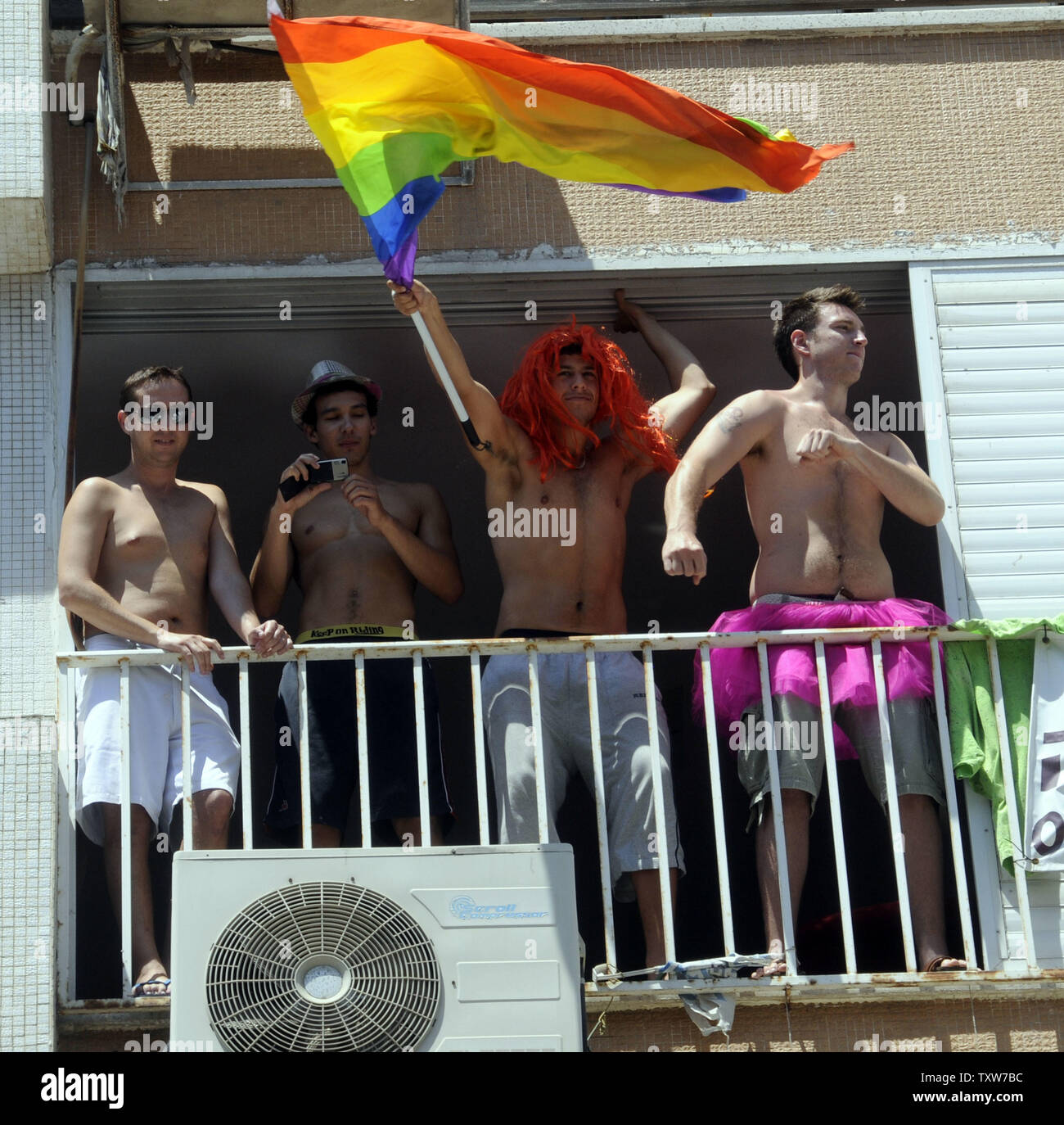 Israelis cheer for marchers  in the Gay Pride Parade in Tel Aviv, Israel, June 12, 2009.  (UPI Photo/Debbie Hill) Stock Photo