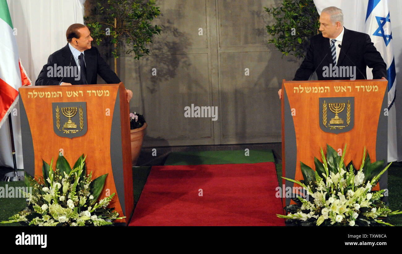 L-R:  Italian Prime Minister Silvio Berlusconi and Israeli Prime Minister Benjamin Netanyahu make remarks at a welcoming ceremony at Netanyahu's Jerusalem office, February 1, 2010. Prime Minister Berlusconi is in Israel for a three- day visit.   UPI/Debbie Hill Stock Photo