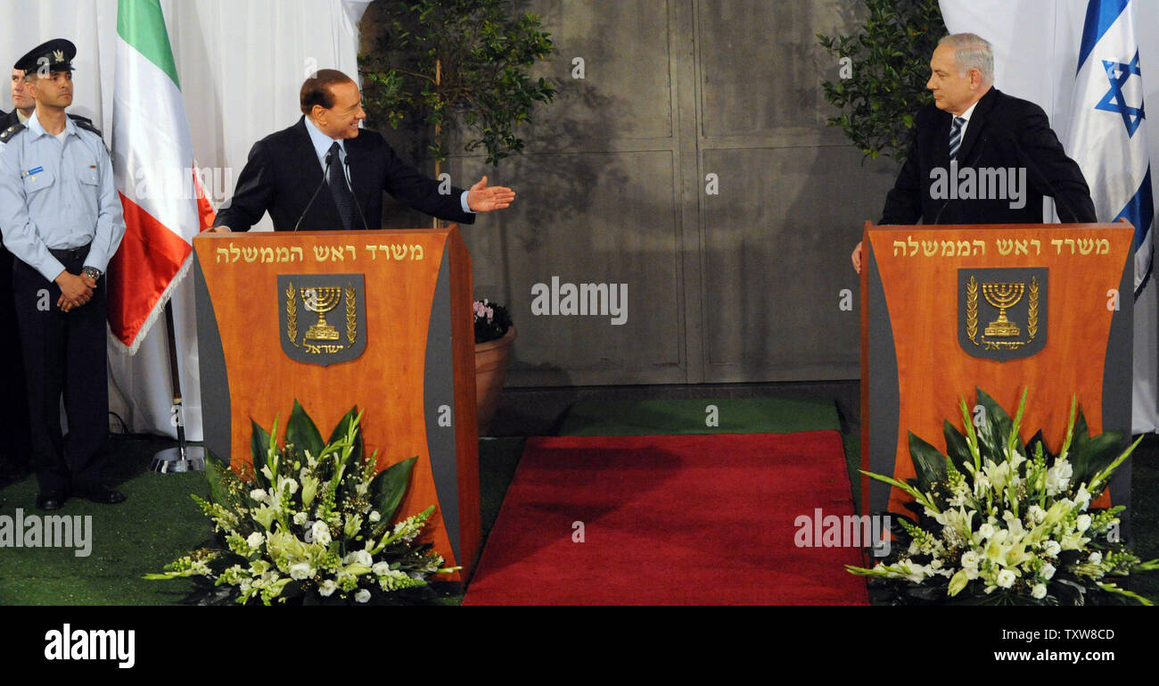 L-R:  Italian Prime Minister Silvio Berlusconi gestures to Israeli Prime Minister Benjamin Netanyahu during a welcoming ceremony at Netanyahu's Jerusalem office, February 1, 2010. Prime Minister Berlusconi is in Israel for a three- day visit.   UPI/Debbie Hill Stock Photo