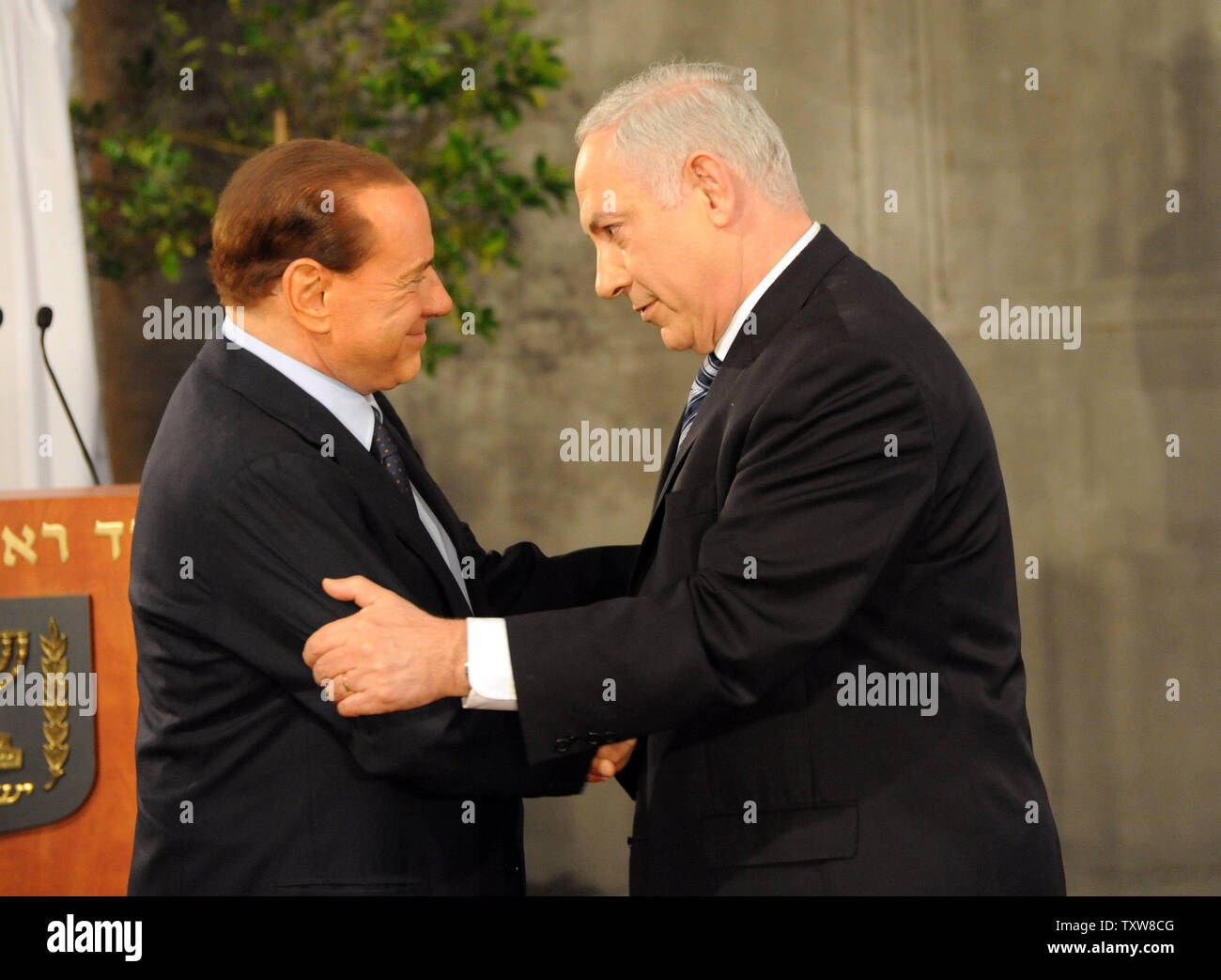 L-R:  Italian Prime Minister Silvio Berlusconi greets Israeli Prime Minister Benjamin Netanyahu during a welcoming ceremony at Netanyahu's Jerusalem office, February 1, 2010. Prime Minister Berlusconi is in Israel for a three- day visit.   UPI/Debbie Hill Stock Photo