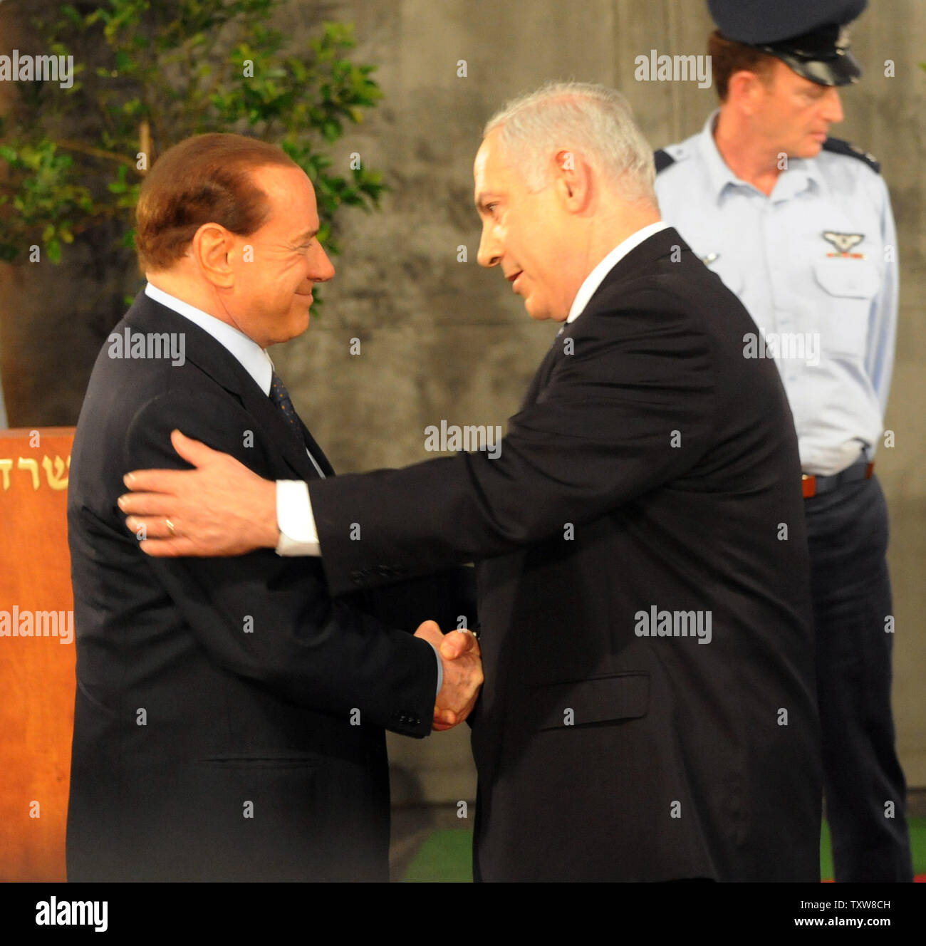 L-R:  Italian Prime Minister Silvio Berlusconi shakes hands with Israeli Prime Minister Benjamin Netanyahu during a welcoming ceremony at Netanyahu's Jerusalem office, February 1, 2010. Prime Minister Berlusconi is in Israel for a three- day visit.   UPI/Debbie Hill Stock Photo
