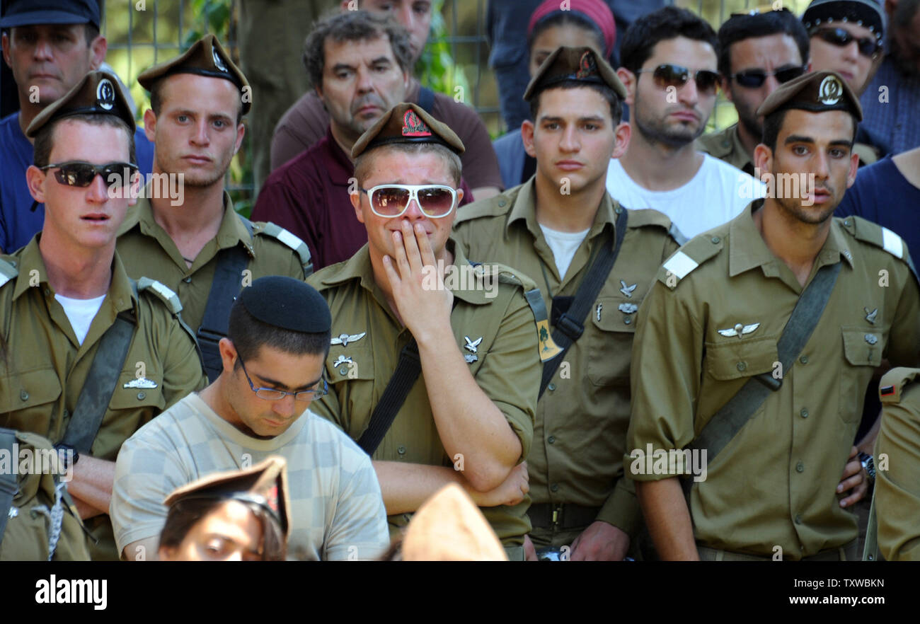 An Israeli soldier cries during the funeral of Staff Sergeant Moshe Naftali, 22, at the Mount Herzl Military Cemetery in Jerusalem, August 19, 2011. Naftali was killed in southern Israel  in a terrorist attack yesterday. Eight Israelis were killed in three terrorists attacks by Palestinians from Gaza who crossed into Israel through Egypt.  UPI/Debbie Hill Stock Photo