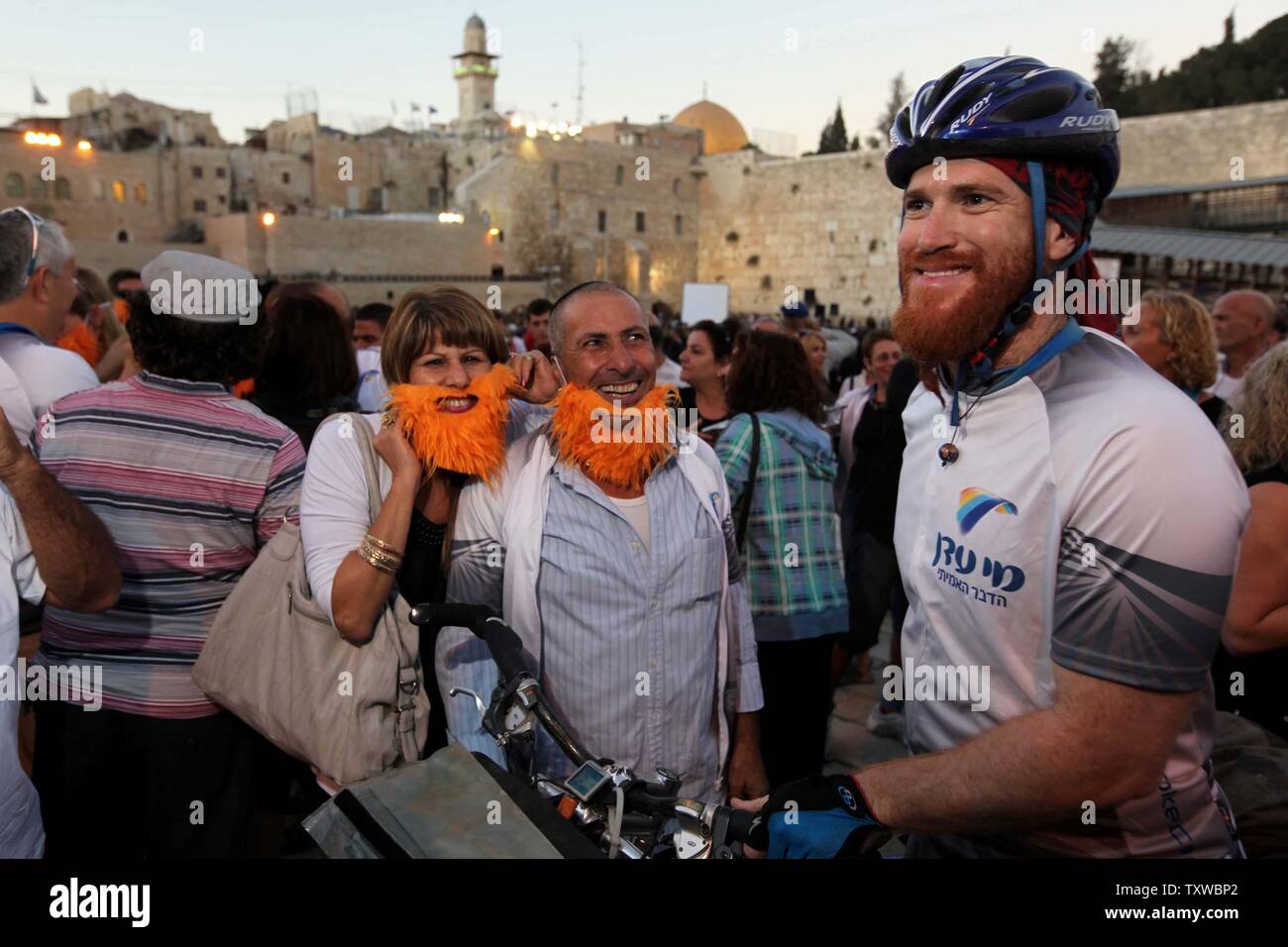 Israeli Roi Sadan completes his around the world trip on his bicycle at the Western Wall in Jerusalem on September 15, 2011.  It took more than four years to cycle through 42 countries and 66,000 km (42,000 Mile).  He nicknamed his bicycle 'Emuna' (faith) and said he was acting as a messenger of brotherhood and peace for the entire world.  UPI Stock Photo