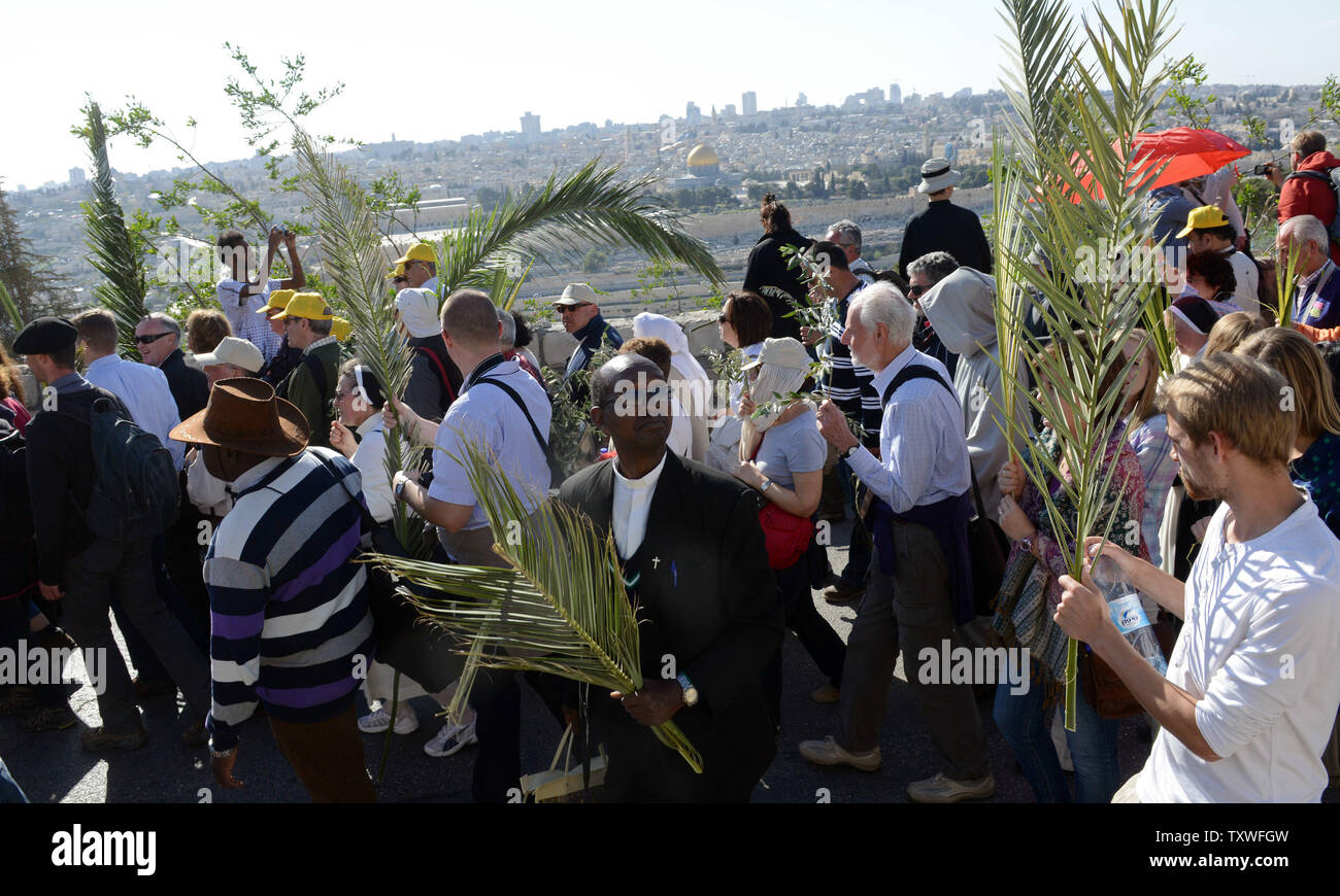 Christians Carry Palm And Olive Branches During The Traditional Palm