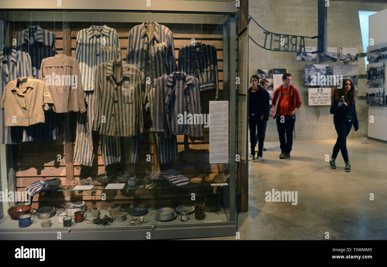 Visitors walks near a display of concentration camp uniforms worn by Jews during the reign of Nazi Germany during War World II, which resulted in the mass murder of six million Jews, in the Yad Vashem Holocaust Museum in Jerusalem, Israel, January 25, 2015. International Holocaust Day will be marked on January 27, the date in 1945 when the Auschwitz-Birkenau concentration camp was liberated by Soviet forces. Photo by Debbie Hill/UPI Stock Photo