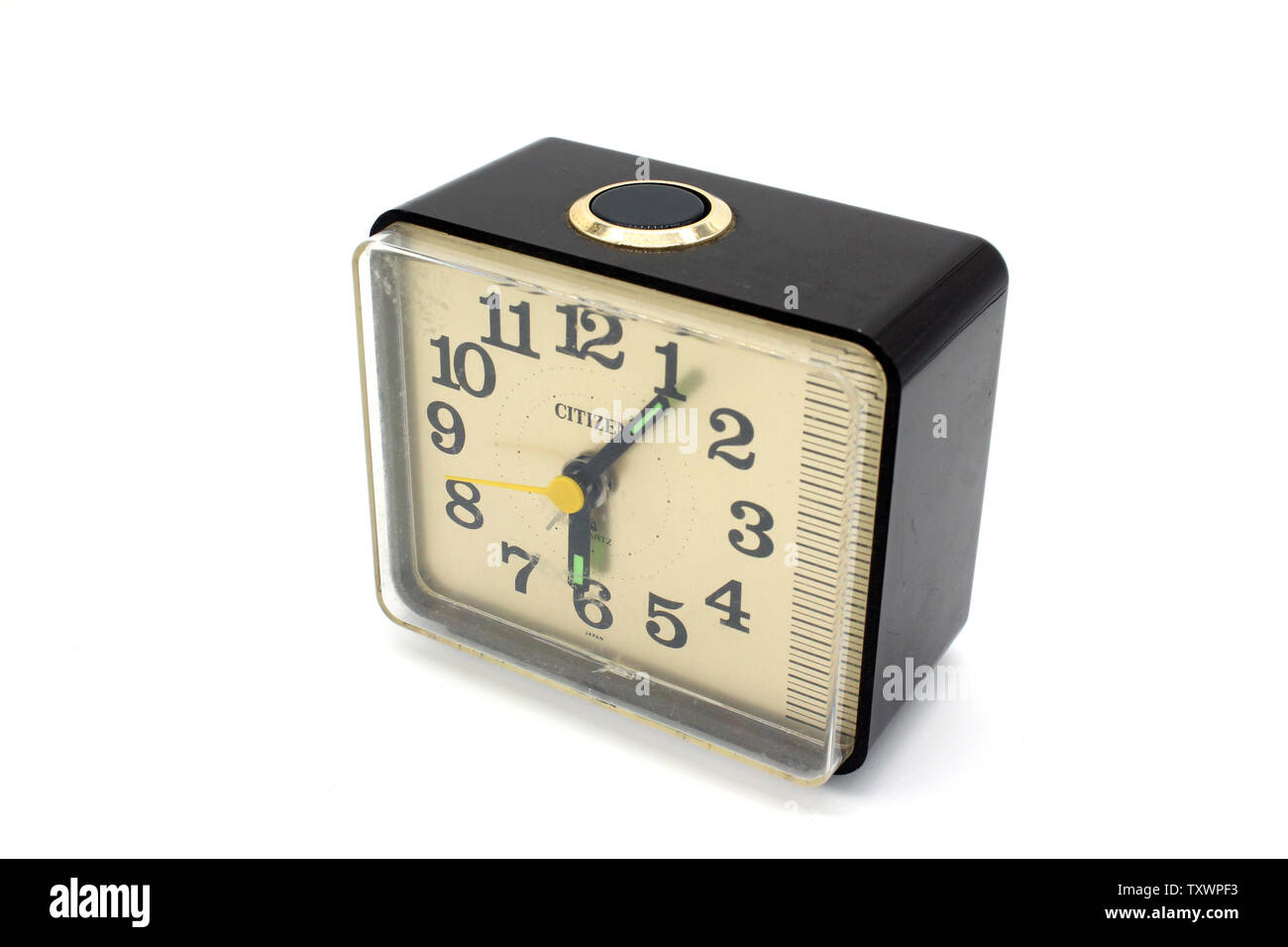 Vintage, plastic Citizen alarm clock, made in Japan, isolated on white  background, close-up Stock Photo - Alamy