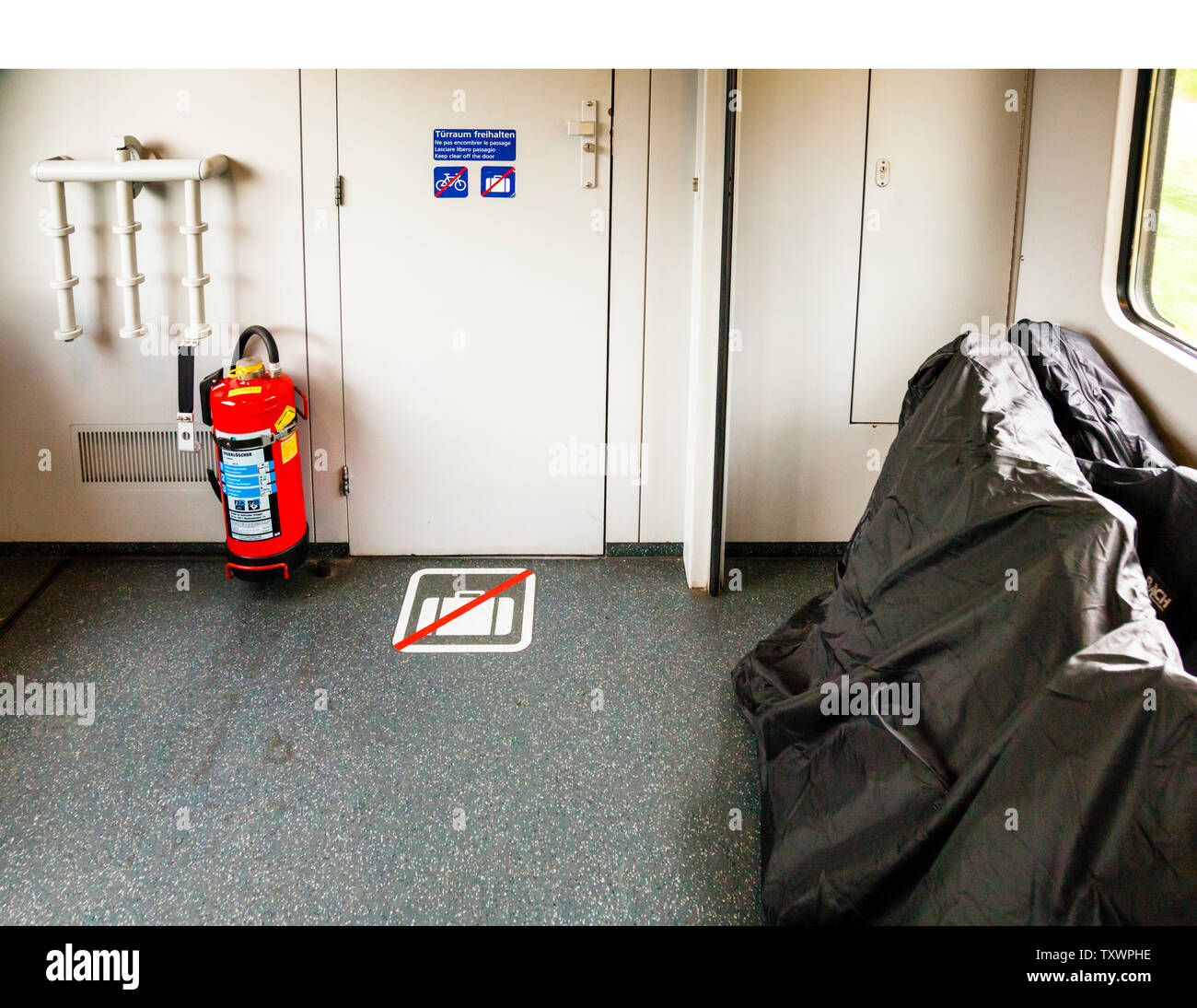 Packaged bicycles in the train compartment of the Austrian railway Stock Photo